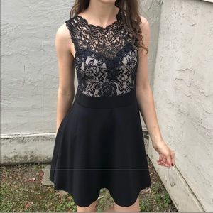 Nude and black lace dress